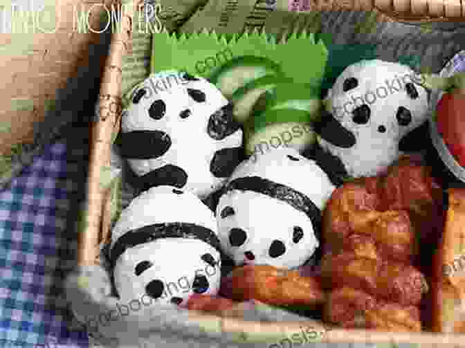 A Bento Box Filled With A Panda Shaped Rice Ball, Cucumber Sticks, And Grapes Bento Blast : More Than 150 Cute And Clever Bento Box Meals For Your Kids