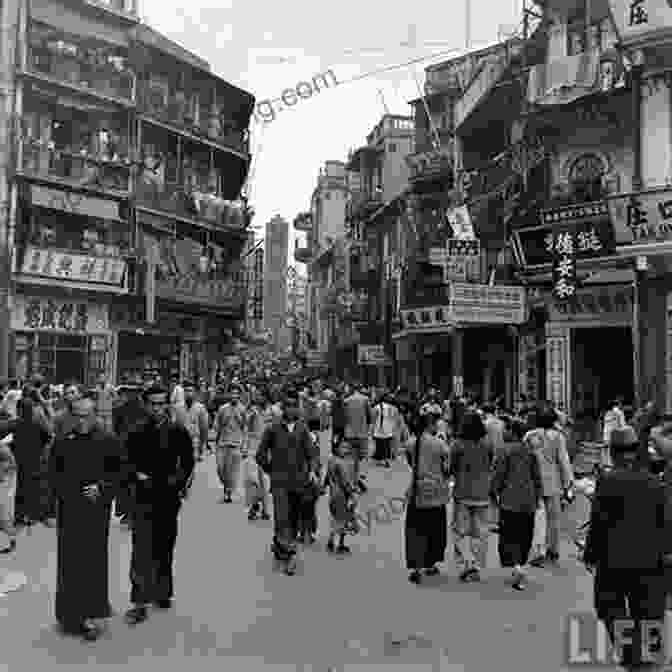 A Bustling Street Scene In Hong Kong During The 1930s, Capturing The Vibrant Energy And Diversity Of The City. A Voyage To War: An Englishman S Account Of Hong Kong 1936 41