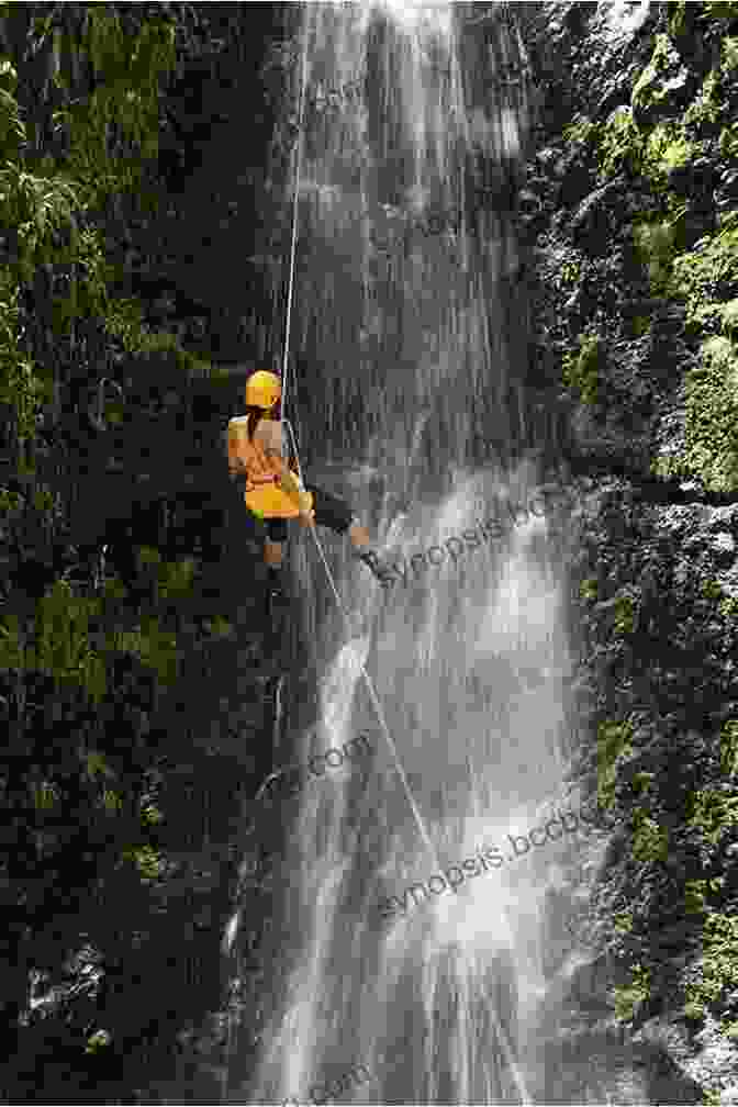 A Group Of Climbers Rappel Down A Wet Waterfall In A Canyon Canyoneering 2nd: A Guide To Techniques For Wet And Dry Canyons (How To Climb Series)