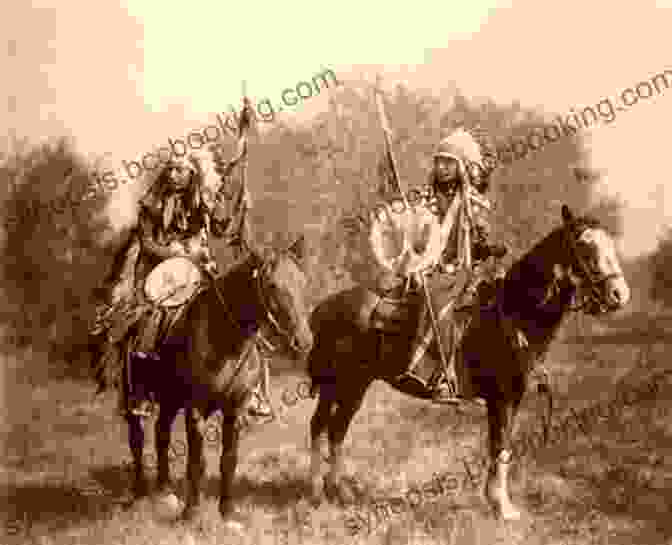 A Group Of Lakota Warriors On Horseback Engaged In A Buffalo Hunt, Showcasing Their Remarkable Horsemanship And Hunting Prowess. My Life Among The Indians (Illustrated)