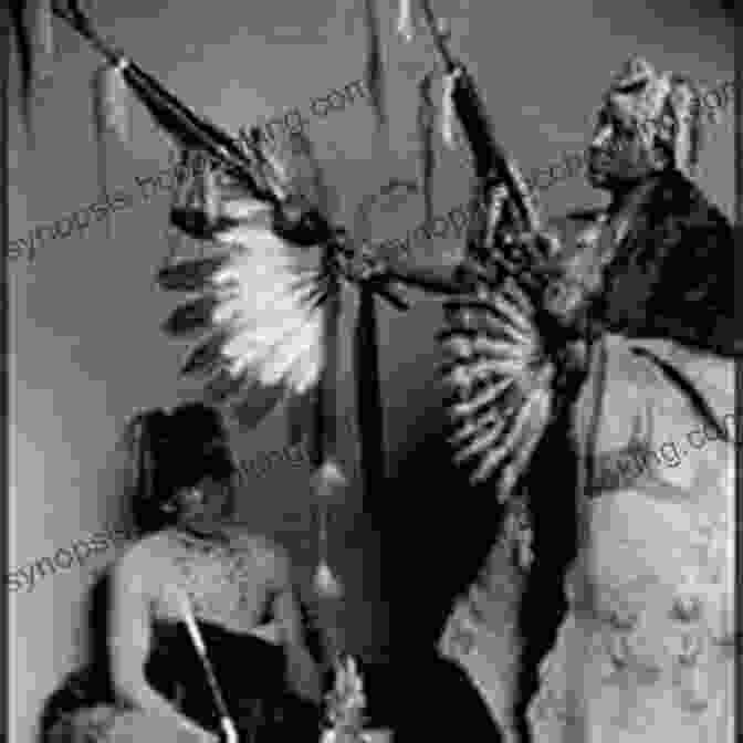 A Lakota Medicine Man Performing A Sacred Ceremony, Surrounded By Members Of The Community. My Life Among The Indians (Illustrated)