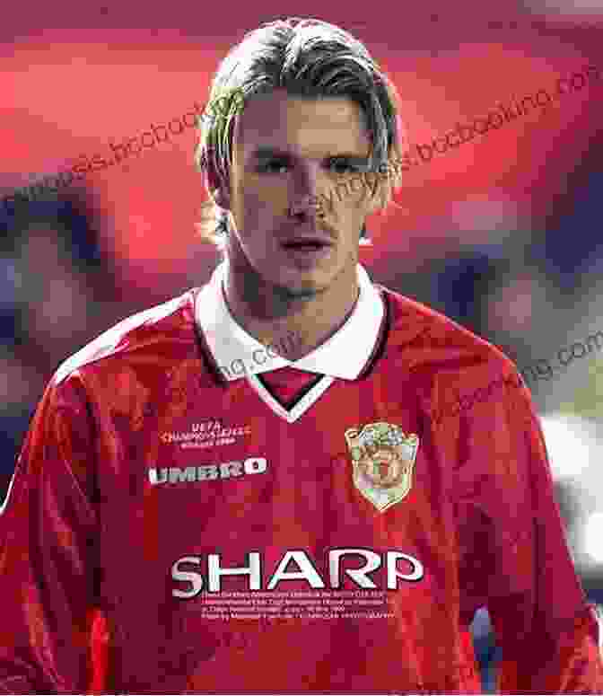 David Beckham Striking A Pose In A Manchester United Jersey Who Is David Beckham? (Who Was?)