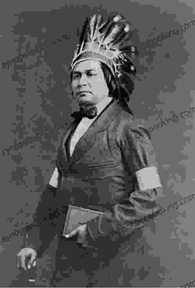 George Copway, A Native American Leader And Author, Stands In A Formal Portrait With A Serious Expression. He Wears A Dark Suit And A White Shirt, And His Hair Is Styled In A Traditional Mohawk. Finding My Roots George Copway