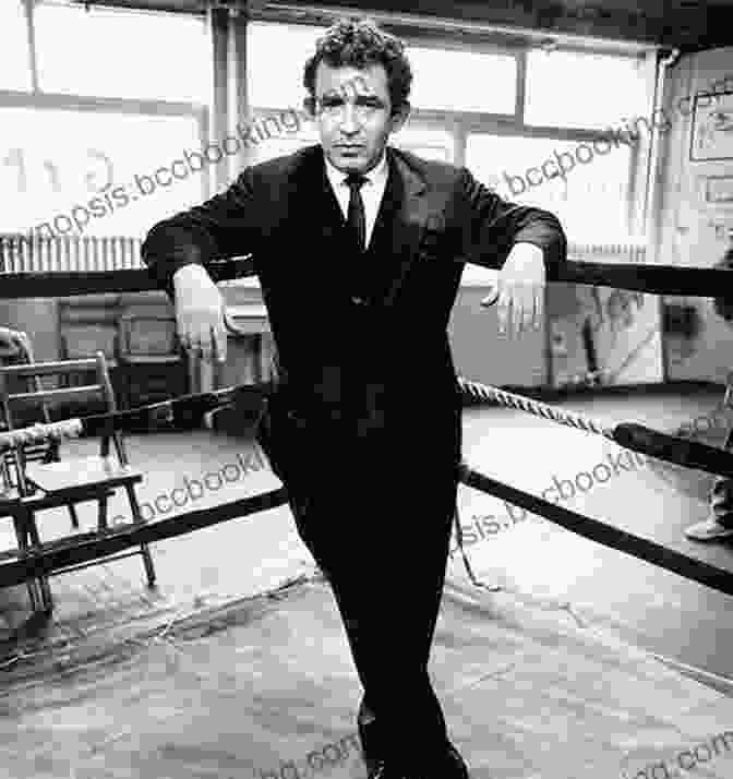 Norman Mailer In A Heated Boxing Match, Fists Clenched And Determination In His Eyes The Fight Norman Mailer